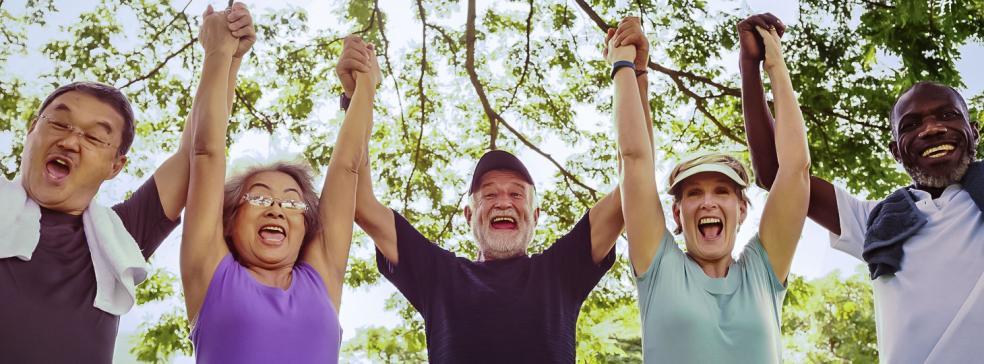 Image of senior friends being active and exercising in a park